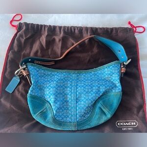 Blue Coach signature bag with suede bottom
